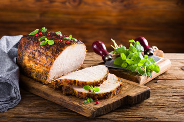 Roasted pork loin with garlic and marjoram