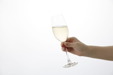 女性の手　シャンパン　乾杯　Champagne