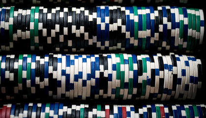 High contrast image of casino roulette and poker chips