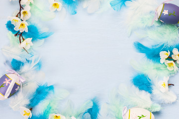 Easter eggs, feathers and flowers