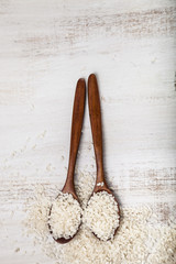Raw rice and two spoons