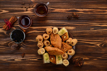 Turkish sweet baklava on plate with Turkish tea. 