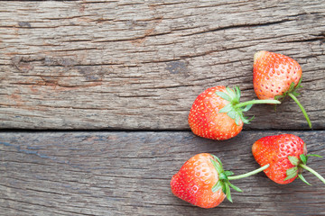 Fresh strawberries on wooden background, Healthy and Diet food