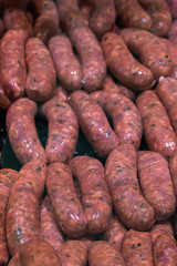 Raw sausageclose up. Store display. Butcher display.