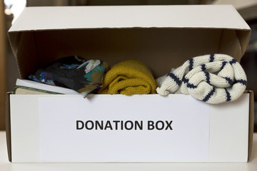 Donation box with clothes and books