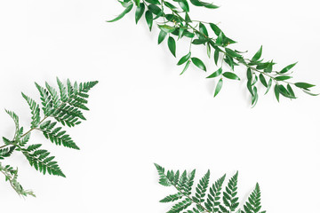 Leaf pattern. Green tropical leaves on white background. Flat lay, top view, copy space