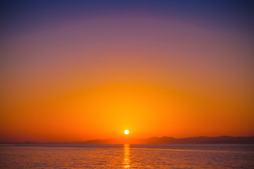 Naklejka premium Beautiful sunset in a harbor of small town Postira - Croatia