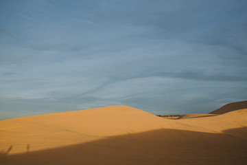 Fototapeta na wymiar amazing landscape with beautiful sand dunes in desert near Mui Ne, Vietnam