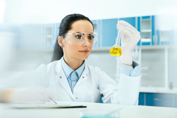 Laboratory Test. Female Doing Medical Urine Examination