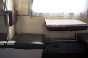 View of the empty seats in the lower second-class compartment wagon train