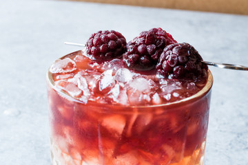 Bramble Cocktail with Blackberries and Crushed Ice.