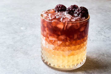 Bramble Cocktail with Blackberries and Crushed Ice.
