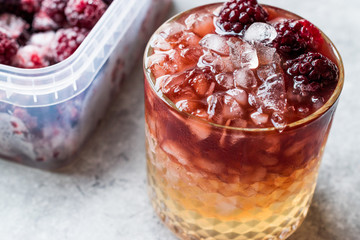 Bramble Cocktail with Blackberries and Crushed Ice.