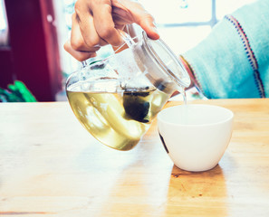 Woman pouring tea