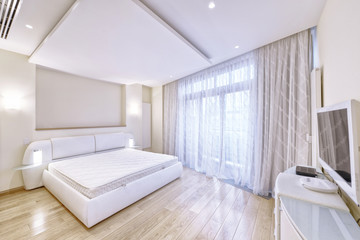 Modern interior of a bedroom in the new house.