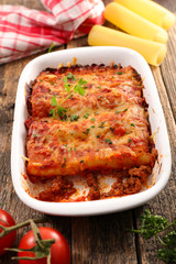canneloni with beef and tomato sauce