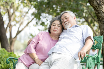 Naklejka premium Senior People sleep together at outdoor park. Elder people with relax emotion together. People lifestyle concept.