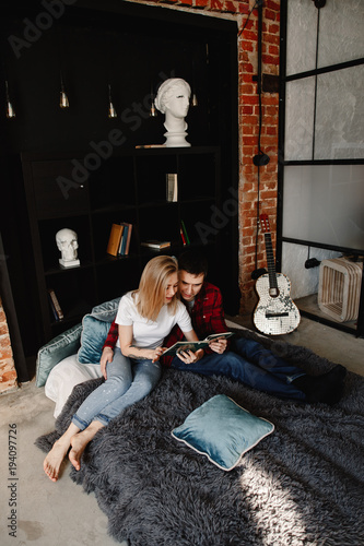 Stylish Young Couple Having Fun In Cozy Bedroom In Style