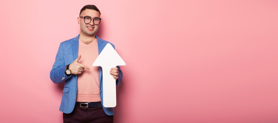 Handsome man in bright jacket with speech pointer