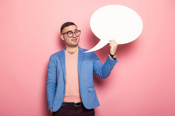 Handsome man in bright jacket with speech bubble
