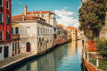 Fototapeta na wymiar Canal in Venice, Italy. Architecture and landmarks of Venice