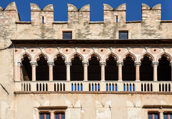 Detail of the venetian gothic Loggia of the majestic Castle of Buonconsiglio at the heart of the city of Trento towers in Trentino Alto Adige, Italy.