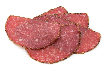 Salami slices isolated on the white background.