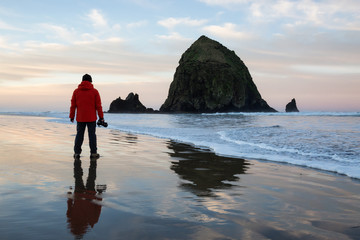 Photographer taking pictures of the beautiful Oregon Coast