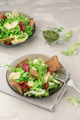 Frisee lettuce salad with sun dried tomatoes