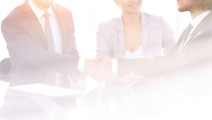 handshake of business partners.business background