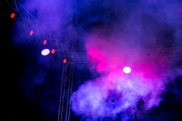 Color searchlight at a concert at night