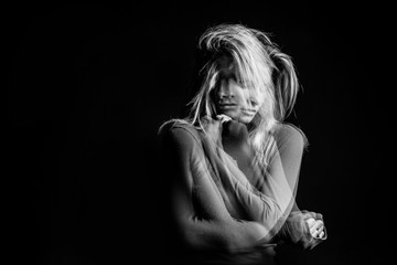 Emotional dreamy woman portrait triple Multiple exposure black and white photo. Hug suport and love...
