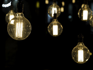 Filament antique looking light bulbs hanging from ceiling