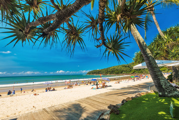 NOOSA, AUSTRALIA, FEB 17 2018: People enjoying summer at Noosa main beach - a famous tourist destination in Queensland