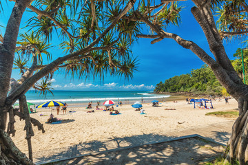 NOOSA, AUSTRALIA, FEB 17 2018: People enjoying summer at Noosa main beach - a famous tourist...