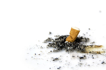 World No Tobacco Day on white background : Cigarette stub prick ground and ashes.