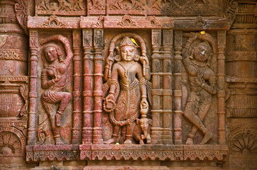 Carved idol on the outer wall, Hatkeshwar Mahadev, 17th century temple, the family deity of Nagar...
