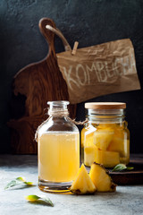 Fermented mexican pineapple Tepache. Homemade raw kombucha tea with pineapple. Healthy natural probiotic flavored drink. Copy space