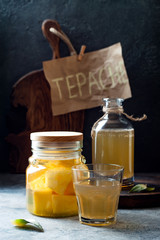 Fermented mexican pineapple Tepache. Homemade raw kombucha tea with pineapple. Healthy natural probiotic flavored drink. Copy space