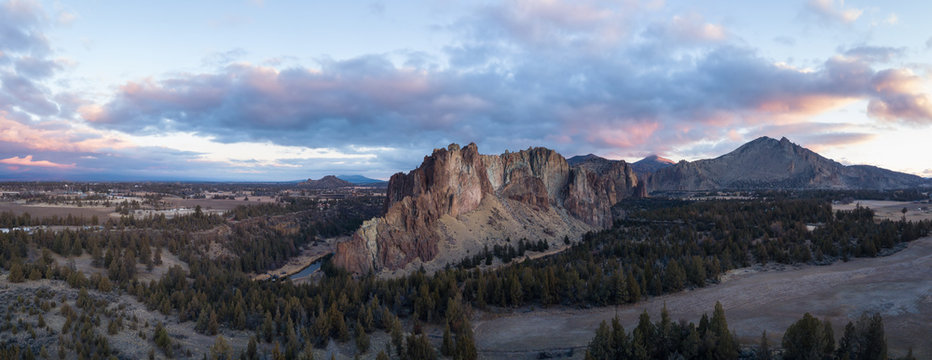 Aerial Panoramic View Of A Beautiful Landmark, Smith Rock, Famous For Rockclimbing. Taken In Redmond, Oregon, America, During A Vibrant Sunrise.