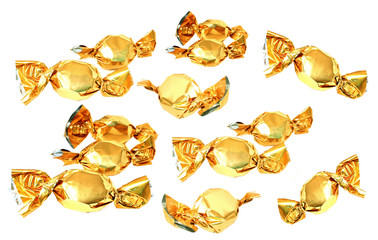 candy in golden foil isolated on white
