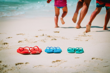 mother with son and daughter on beach