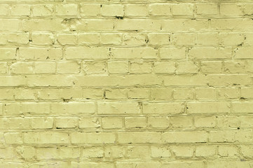 old yellow brick wall texture grunge background, may use to interior design. daylight.