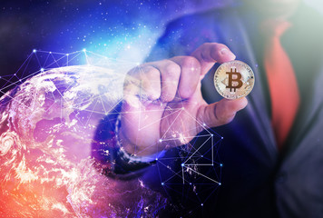 Businessman holding Bitcoin.