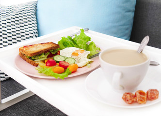  beautiful breakfast Grilled sandwich, fried eggs and coffee. 