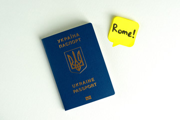 A blue Ukrainian passport says something on a white background. Isolate.