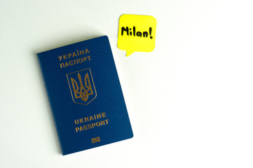 A blue Ukrainian passport says something on a white background. Isolate.