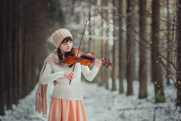 Teenage girl portrait with violin 