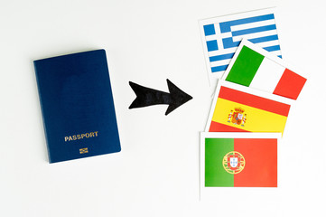 Blue clean passport  and several cards with prapors of the world. Says on a white background. Isolate.