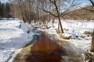 Winter landscape by a river